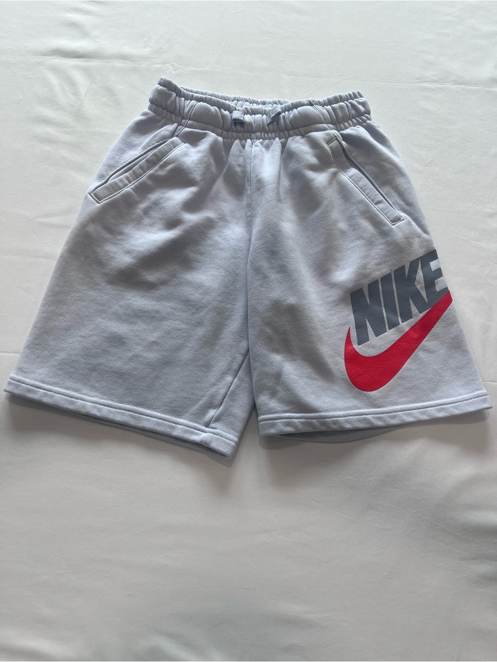 Nike Light Gray Kids Shorts with Red Swoosh